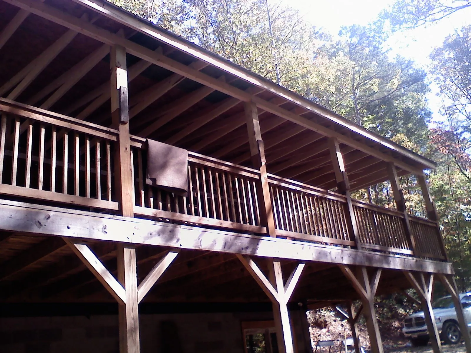 Timber framing under a new elevated porch and deck — Roof Leak Repair in Abita Springs by Roofing Brothers